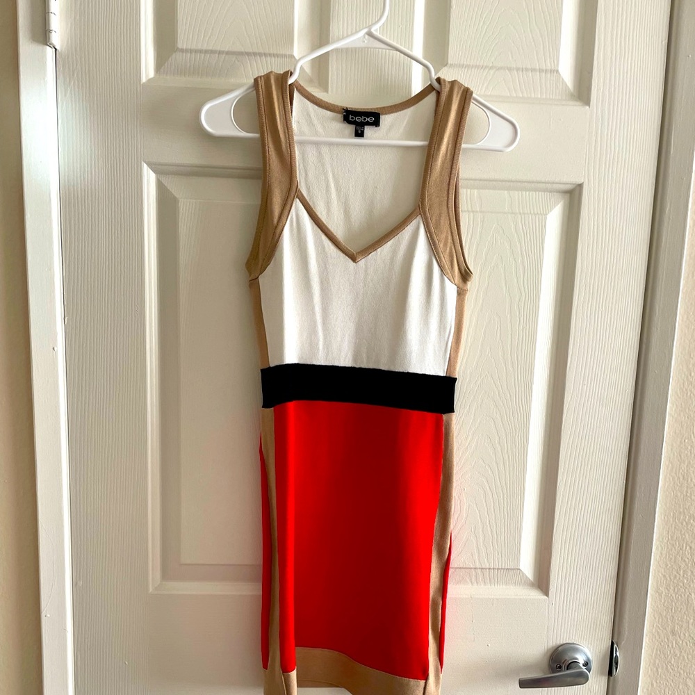 Bebe fitted mini dress in block colors, size S